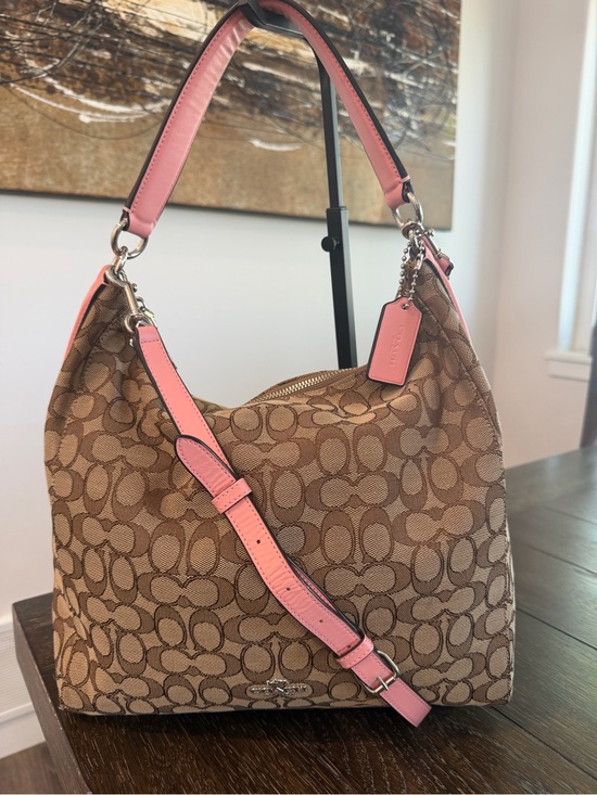 Coach Handbags - Coach Celeste Signature Canvas Hobo Bag with Pink Leather. Style F58327